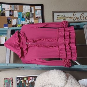Pink child's frilly zip up jacket